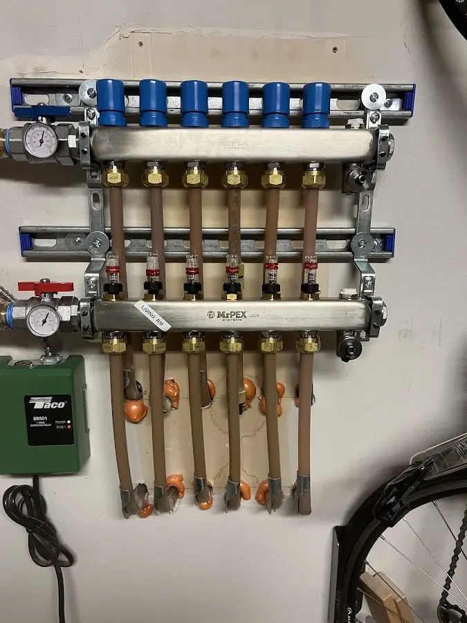 Plumber performing Leak Detection at a residential property in Cedarhurst